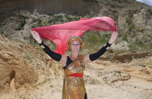 In the sand quarry in a golden dress
