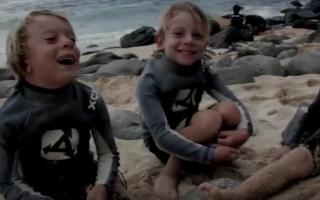 Boys, the brothers Roberson surf (2)