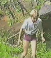 Boy Blond in short with some funny spanking fake by man in forrest (1)
