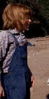 Character boy named Sandy wear blue jean in episode of The little house on prairie