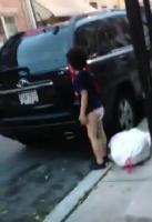 Boy in diaper in the street