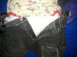 Wet diaper and onesie under jeans
