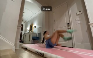 Little girl in socks and skirt doing gymnastik