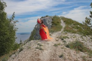 Over the cliff with an orange shawl