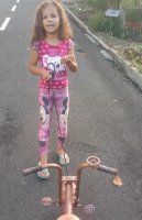 similar girl kid playing playground wearing legging pink and pant
