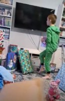 Boy kid wearing pajama green in x-mas