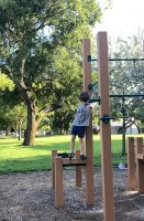Kid boy wearing dark blue short pant in playground 1
