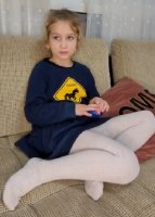 Little Girl from Israel shows her Socks and Feet